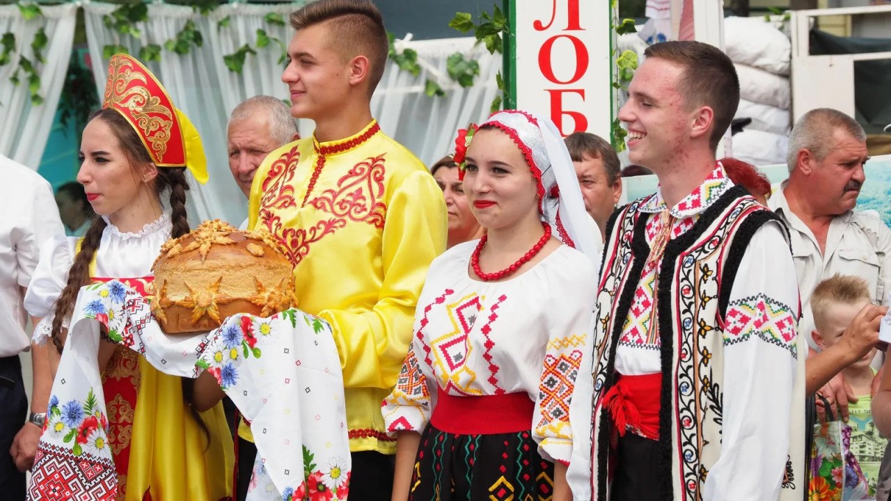On Independence Day, many locals wear colourfully embroidered traditional regional dress (Credit: Sarah Reid)