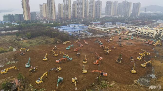 china to build second hospital to treat cases of ncov asia ramps up defence