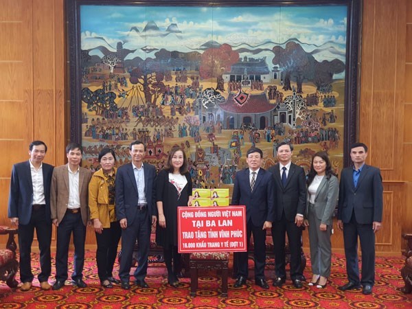 ovs in poland present 16000 face masks to vinh phuc province
