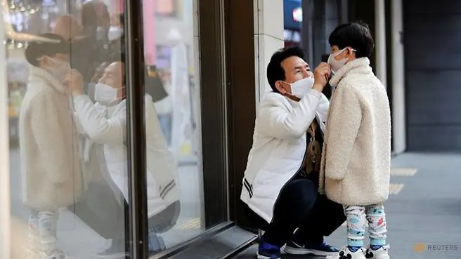 south korea 52 infected with covid 19 total now at 156