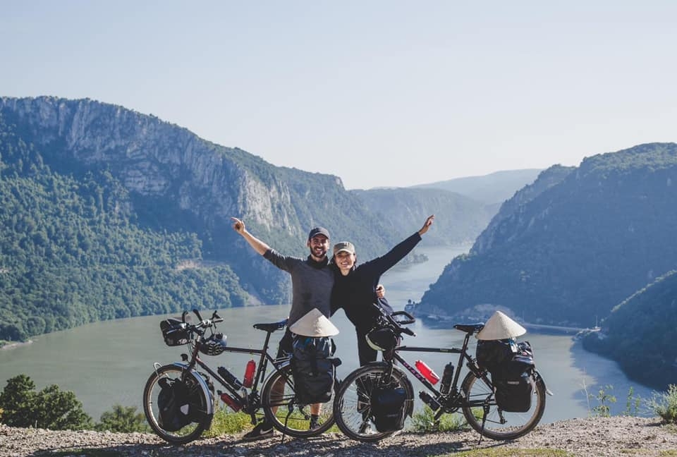 vietnamese french couple cycles from europe to asia for needy children