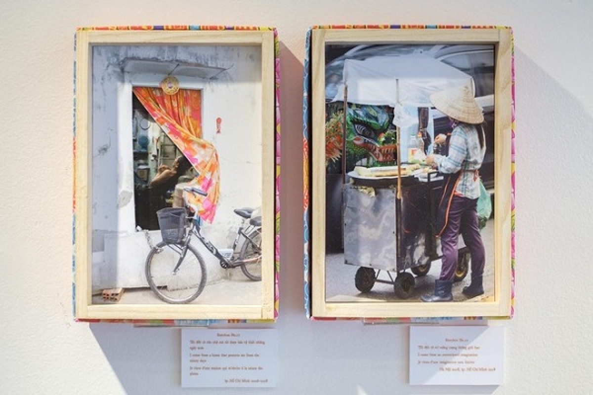 Bérengère Despax, who is also known as Bibi, and Nadège Simard have launched an exhibition in Hanoi with a range of special boxes showcasing the Vietnamese landscape and local people going about their daily lives. Photos: L'Espace