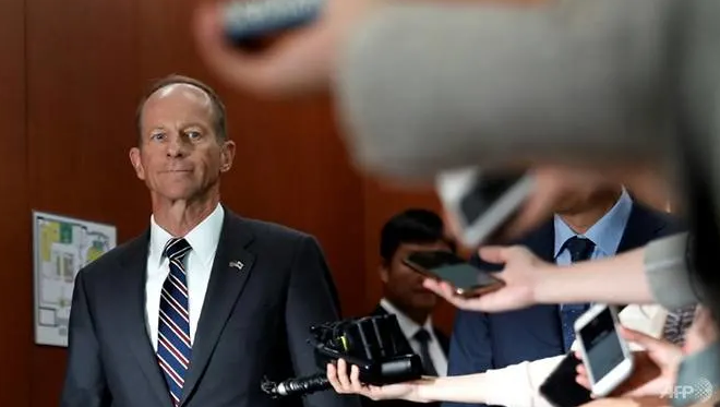 us official says sanctions against china a possibility while beijing vows retaliation over us law on hong kong