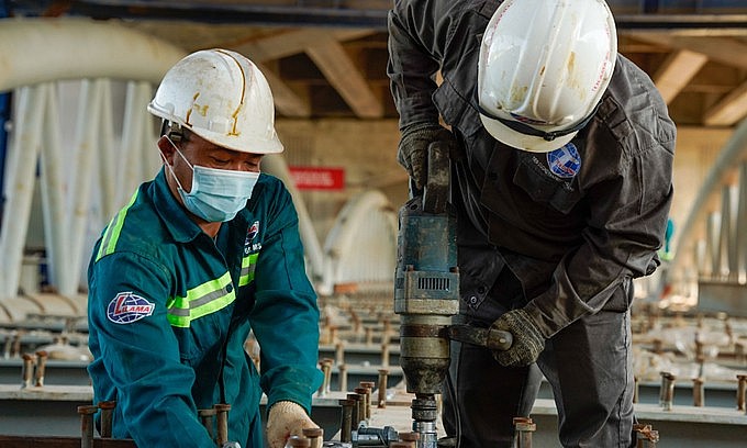 Experts: Vietnamese Economy Regains Momentum in 2022 thanks to Macroeconomic Stability
