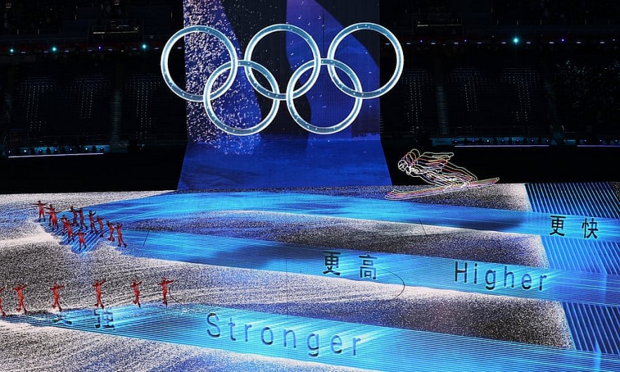 The Olympic motto is unveiled during the Beijing 2022 Winter Olympics opening ceremony. Photograph: Maddie Meyer/Getty Images
