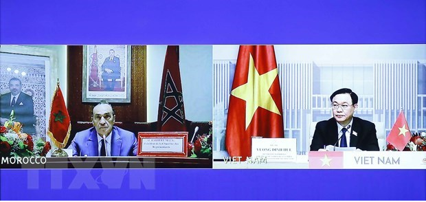 NA Chairman Vuong Dinh Hue (R) and Speaker of the Moroccan House of Representatives Habib El Malki at the teleconferenced talks (Photo: VNA)