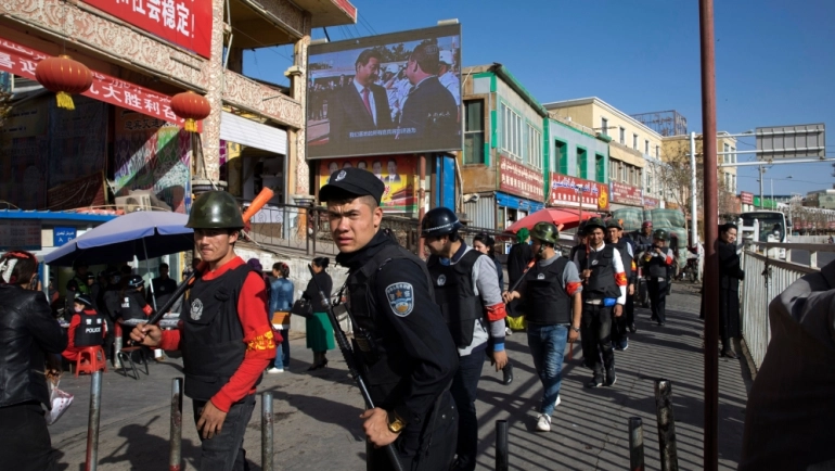 In 2019, the Trump administration also added some of China’s top artificial intelligence startups to its economic blacklist over its treatment of Muslim minorities in Xinjiang, including widespread surveillance [File: Ng Han Guan/AP]