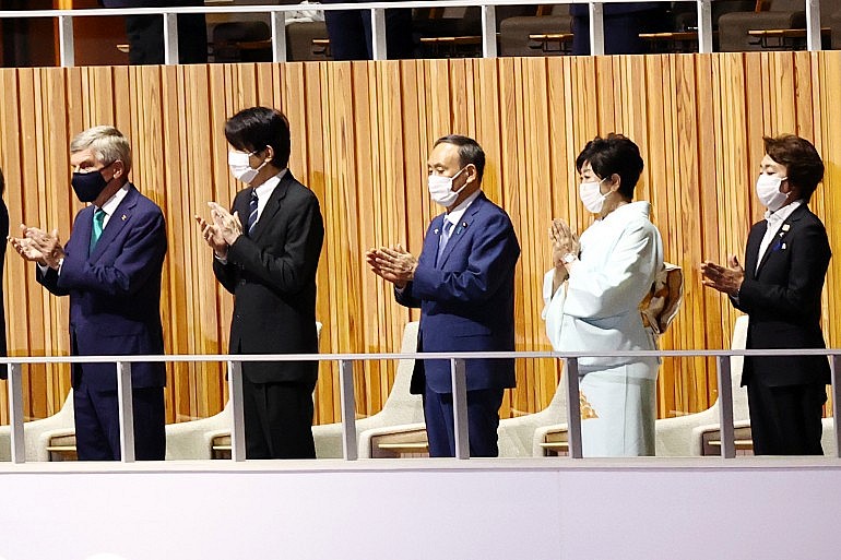 As prime minister, Suga was weighed down by criticism of the pandemic, which also affected efforts to revive the country’s economy [File: Wu Hong/EPA]