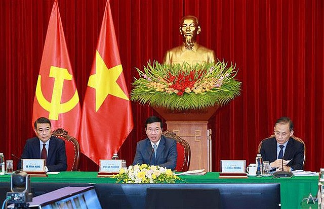 Vietnam, Laos Share Party Building Experience