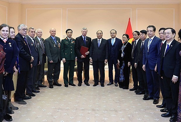  President Nguyen Xuan Phuc meets representatives of the Russia-Vietnam Friendship Association and the Association of Russian Veterans in Vietnam on December 2 . (Photo: VNA)