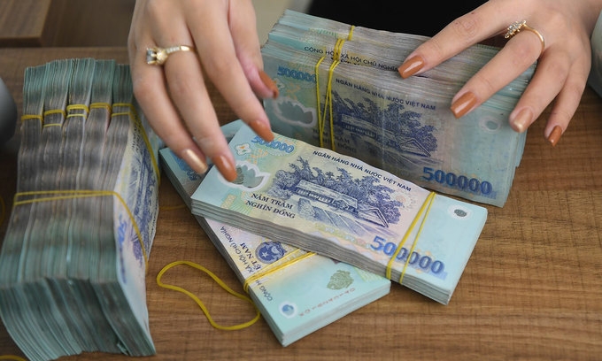 vietnam central bank reduces rates to aid post pandemic recovery