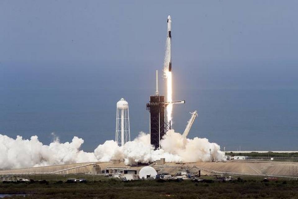 spacex successfully launches nasa astronauts into orbit