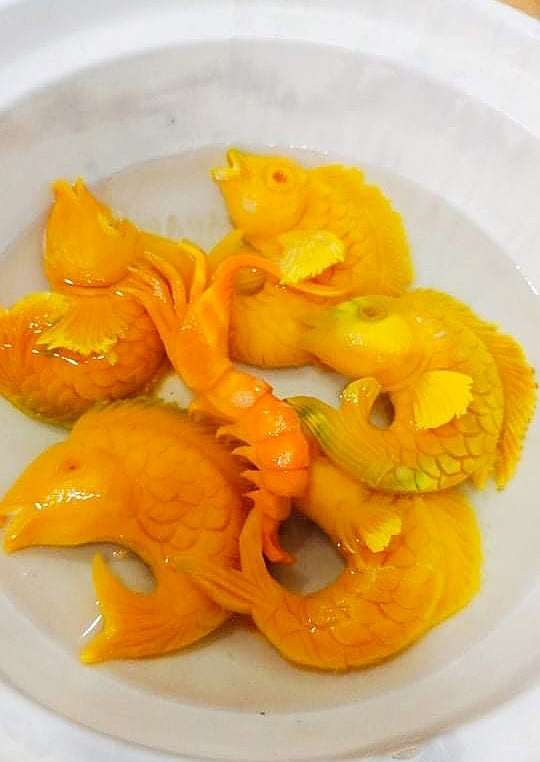 Vietnamese woman inspires cooking with flowers images on dishes Vietnamese woman inspires cooking with flowers images on dishes