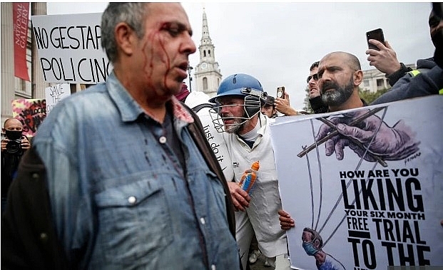 Anti lockdown protests in the UK: Nine cops injured as Trafalgar Square and Hyde Park bombarded by thousands of maskless protesters