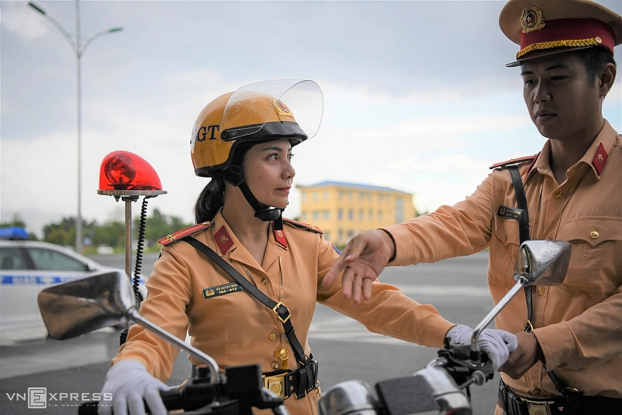 Vietnamese traffic policewomen exercise to lead groups of delegation by powerful motorcycles. Vietnamese traffic police women exercise to lead groups of delegation by powerful motorcycles.