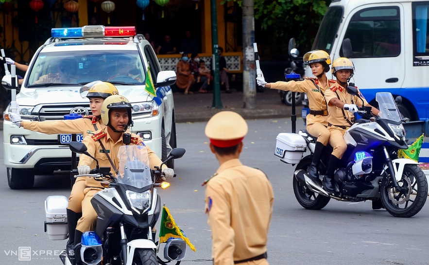 Vietnamese traffic policewomen exercise to lead groups of delegation by powerful motorcycles. Vietnamese traffic police women exercise to lead groups of delegation by powerful motorcycles.
