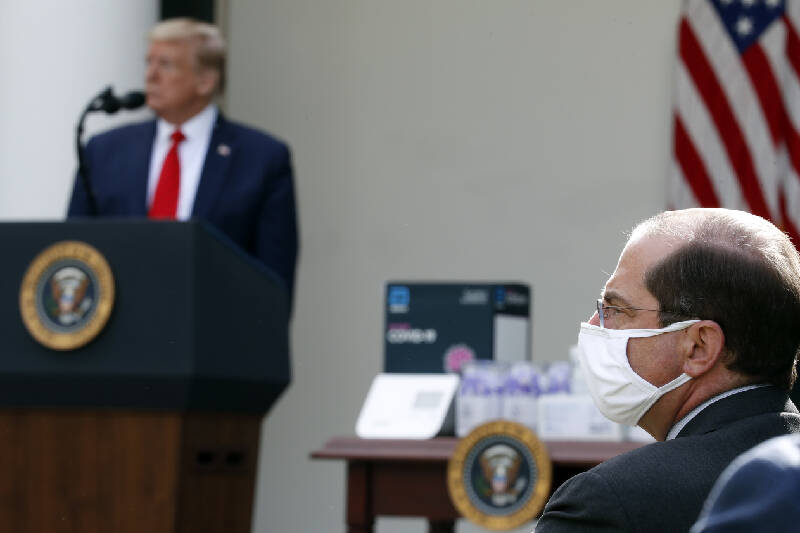 president trump amid media storm against his first reaction to 100000 deaths still focuses on make america great again