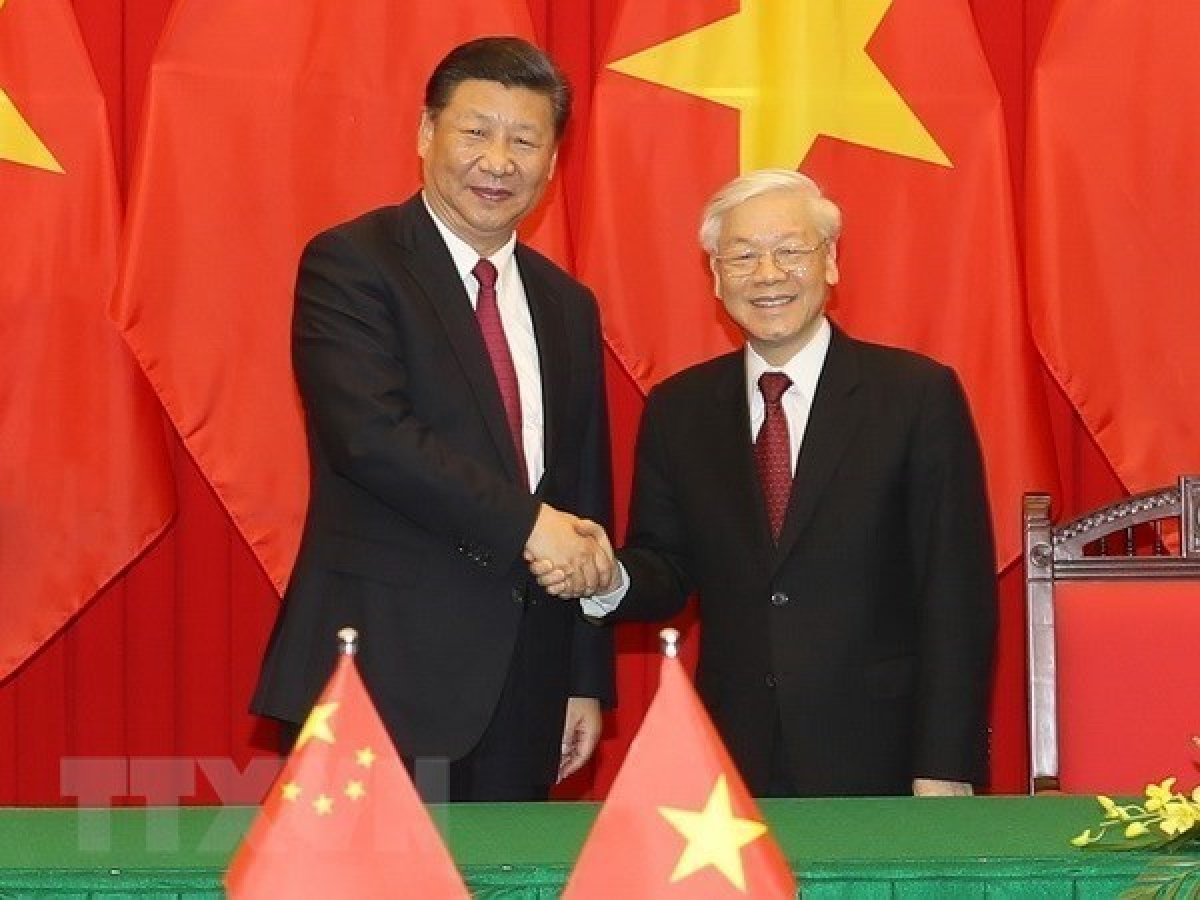 Vietnamese Party General Secretary and State President Nguyen Phu Trong (R) and his Chinese counterpart Xi Jinping during the former's visit to China in January 2017.(Photo: VNA)