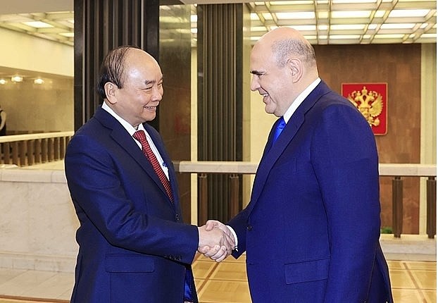 President Nguyen Xuan Phuc (L) and Russian Prime Minister Mikhail Mishustin during their meeting in Moscow on December 1 as part of the former's official visit to Russia. (Photo: VNA)