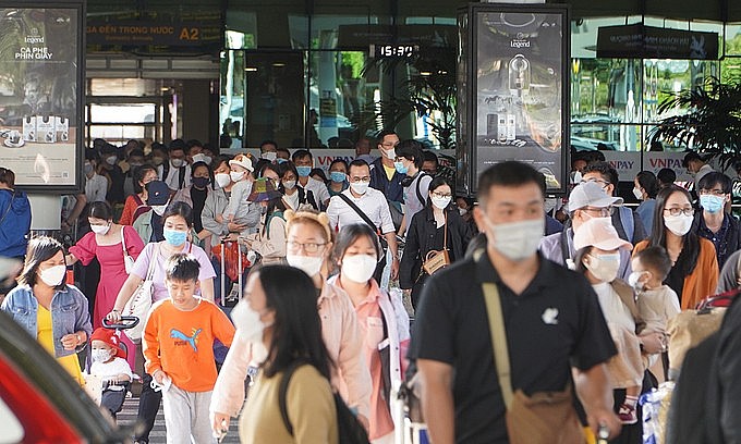 HCMC's Tan Son Nhat airport is overrun by air travelers returning from the Tet holiday on Feb. 5, 2022. Photo: VnExpress