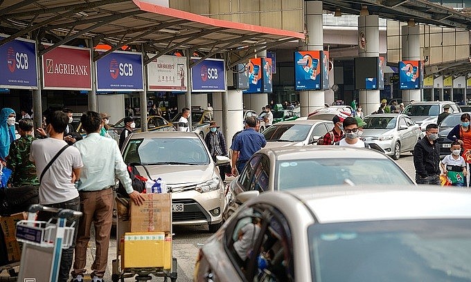 Passengers gather at Hanoi's Noi Bai Airport before the Lunar New Year holiday. Photo: VnExpress