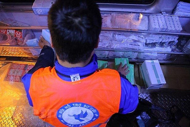 First-Aid 'Angels' Protect Vietnamese Motorists
