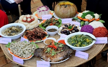 Cooking smoked buffalo: a must-try dish of the Thai ethnic group