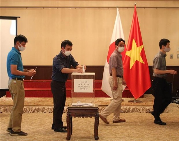 Overseas Vietnamese in Japan, Laos support Covid-19 vaccine fund