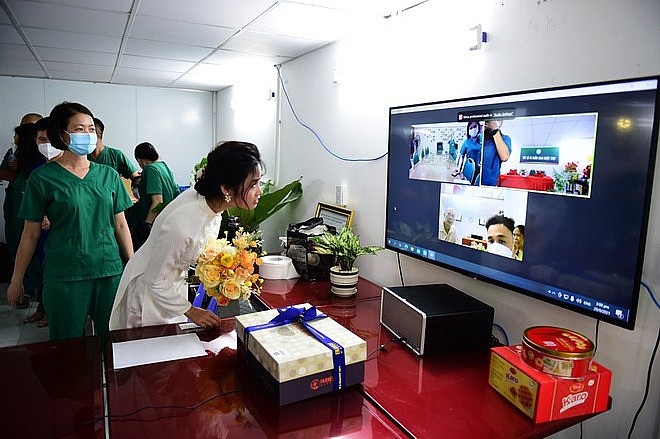 Love in Times of Covid: HCMC Nurse Attends Virtual Wedding