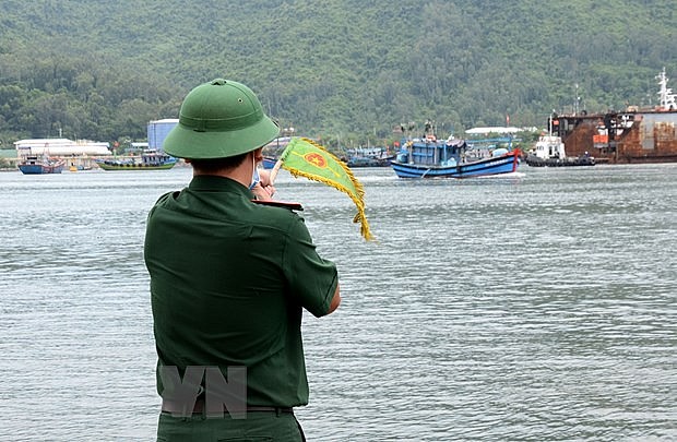 Vietnam's Border Patrol, Fishermen Team Up on the High Seas
