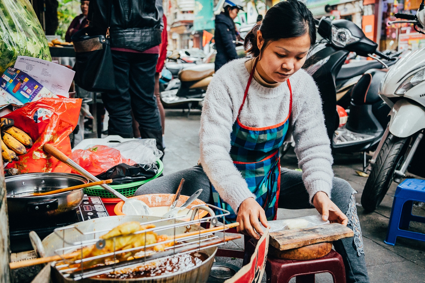 Hanoi requires street food vendors to wear masks