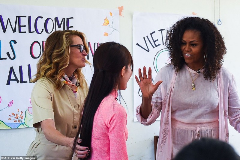 us former first lady michelle obama urges vietnam girls to stay in school
