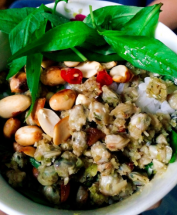 enjoying hue style rice with baby clams