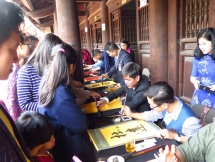 hanoi residents seek calligraphy letters for tet good lucks