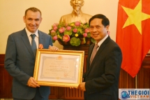 friendship medal presented to former french ambassador