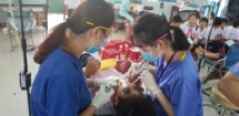 ngo prepares food for quang nams needy families