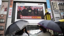 millions around the world watch in awe as historic trump kim summit unfolds