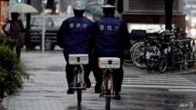 heavy rains force evacuation of thousands in japan one killed