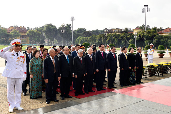 National leaders pay tribute to late leader, martyrs on National Day