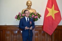 first class labour order presented to outgoing lao ambassador