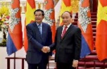 three families of vietnamese cambodians receive new houses after blaze last year