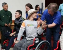 medipeace vietnam presents electric wheelchairs to children in quang tri